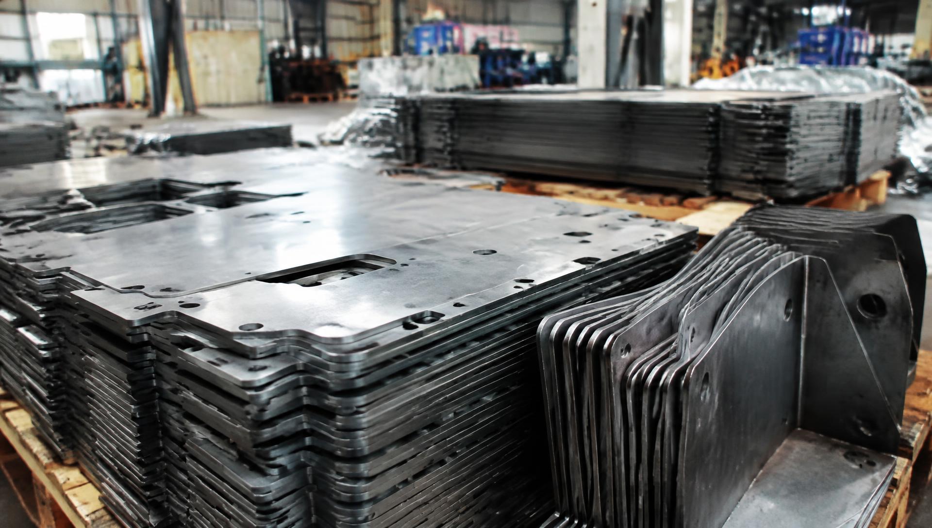 Stacks of precision laser cut steel components